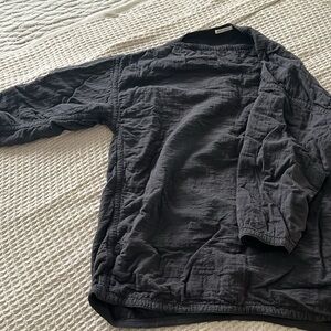 Black crane quilted tunic boat neck pullover